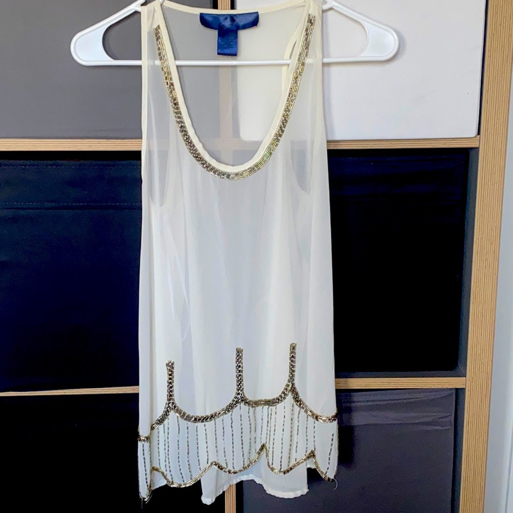 White top with beads design, transparent.